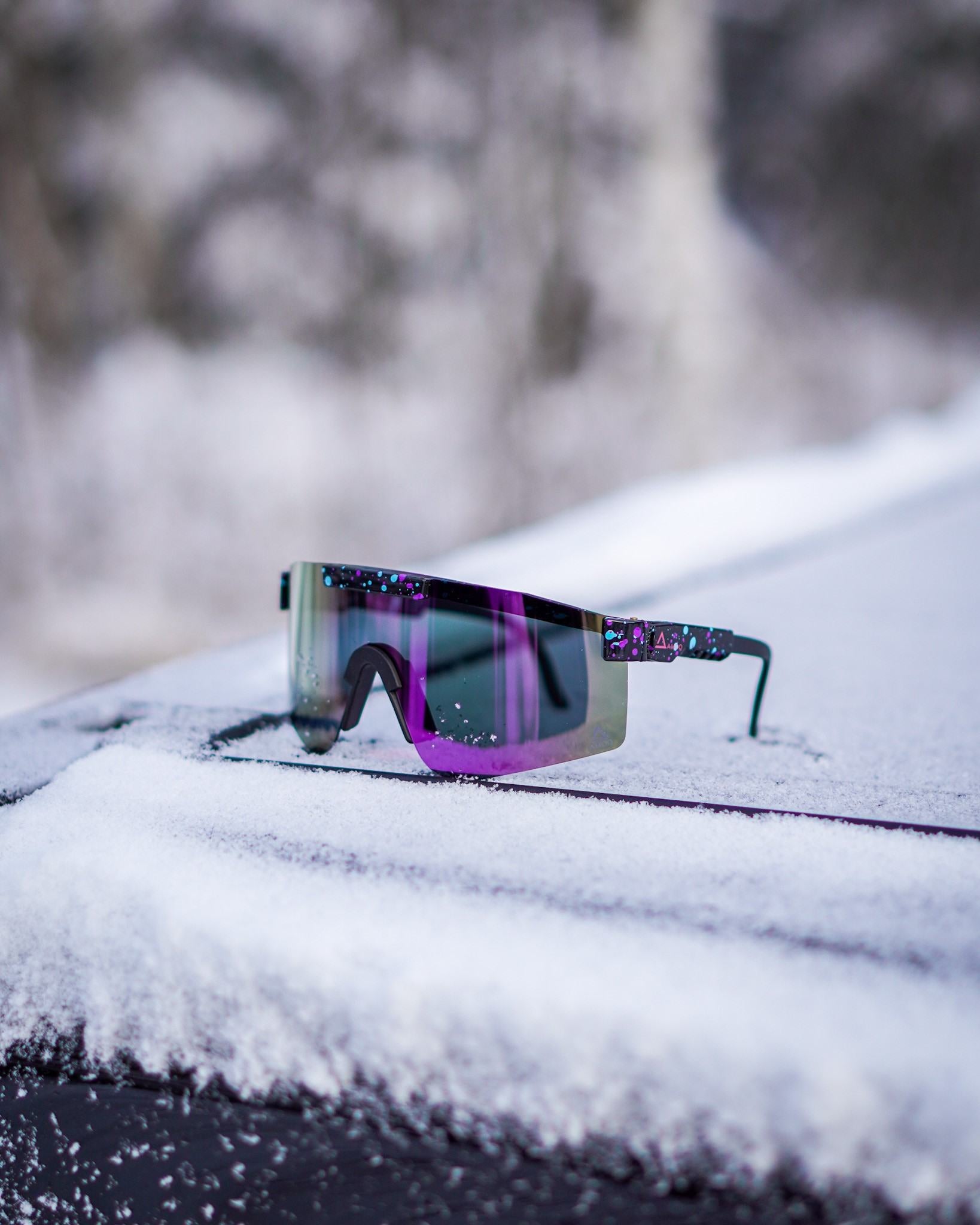 AMOQ Comet Aurinkolasit Musta Splash - Lila Peili